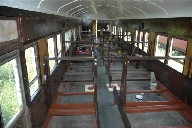 Still a way to go, but seats are fitted awaiting cushions. The roof is complete and painted