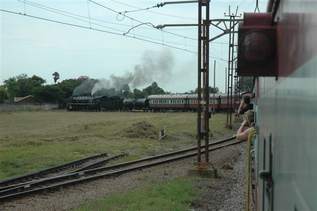 View from the van as 3117 heads for Cullinan, with the last part of the train still on the main line. This is the last clear curved vantage point before the suburbia settings ruin photography!