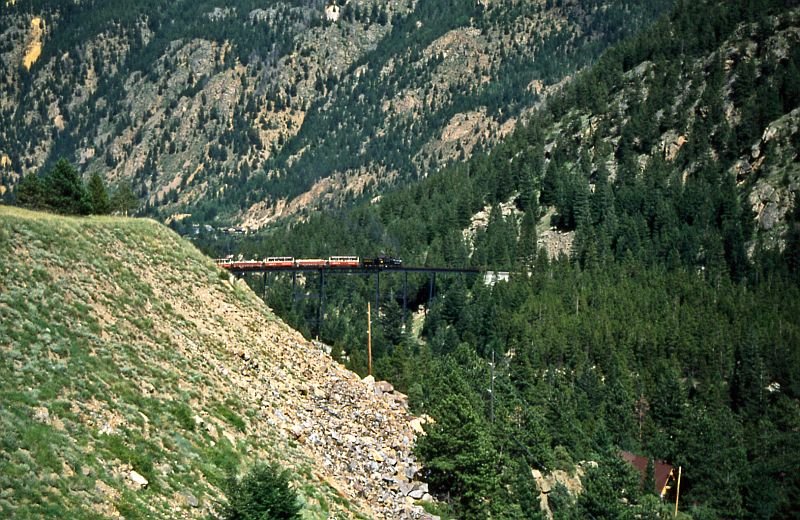 From this point the railway looks like a model railway. Shay No.12 with its train is passing the bridge.