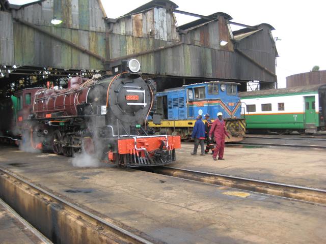 3020 takes water in the old steam shed en route from the works to the station