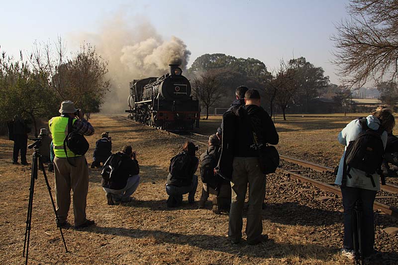 Safety officer Kevin records the antics of photographers for his black book.