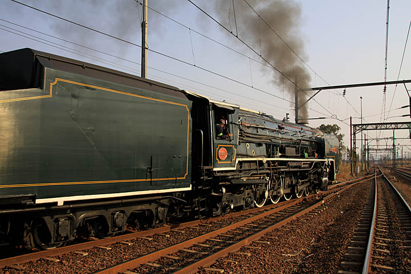 Trainee driver Alwyn at the regulator watches the signals out of the yard