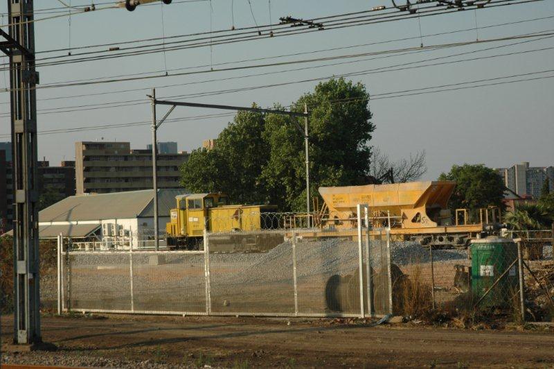 This very broad gauge diesel shunter and ballast hopper on the Gautrain line in Pretoria station