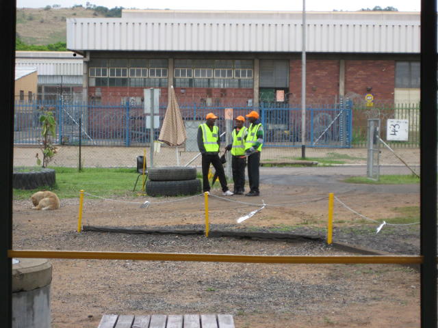The car park crew relax and have a chat now that all the cars are safely inside