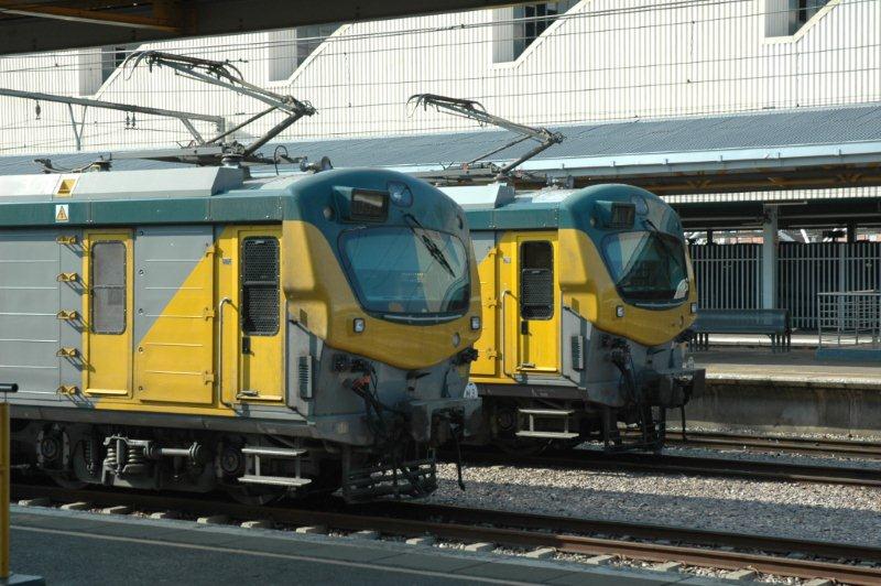 Metro PRASA commuter services motor coach sets with their revamped faces, stand waiting for departure at Pretoria station.