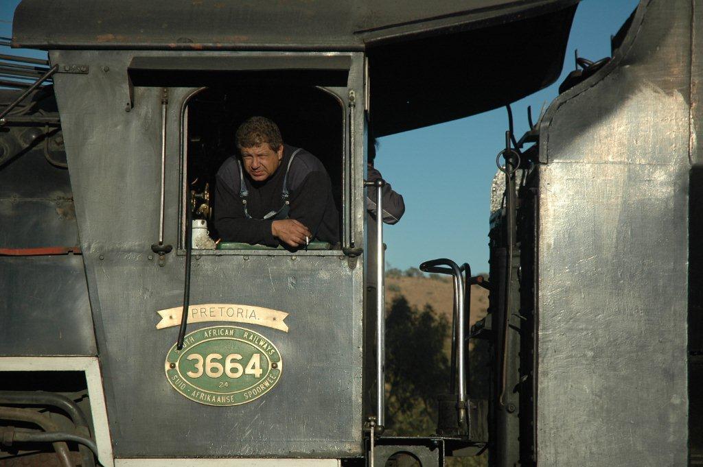 Hard work being a Fireman on a steam locomotive. Gabor Kovacs has been at work shoveling coal for the photo runpasts!