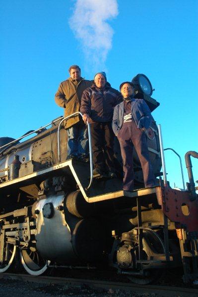 Gabor Kovacs, Tony Attwell and Nathan Berelowitz, catch the first rays of sunlight as they begin to get ready for the open day's activities