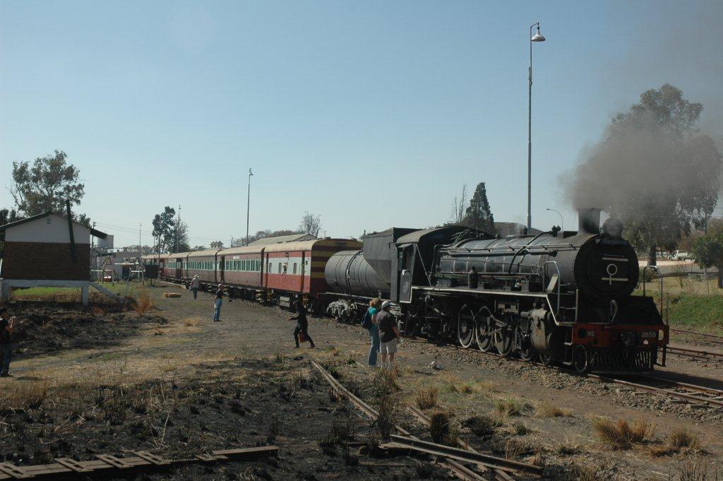 There has been a lot of sleeper replacement from steel to concrete on the section to Rayton. Much of the old disused track is being removed and makes a "pick up sticks" effect! Gabor Kovacs getting ready to depart as driver of this train to Pretoria.