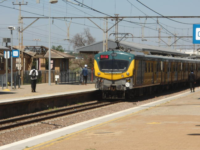 The Metro set arrives; just a freight train to wait for now