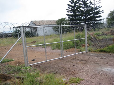 The workers' entrance. This gate will probably be locked out of use once the main gate (above) is in use, so there will only be one entrance to the site in regular use.
