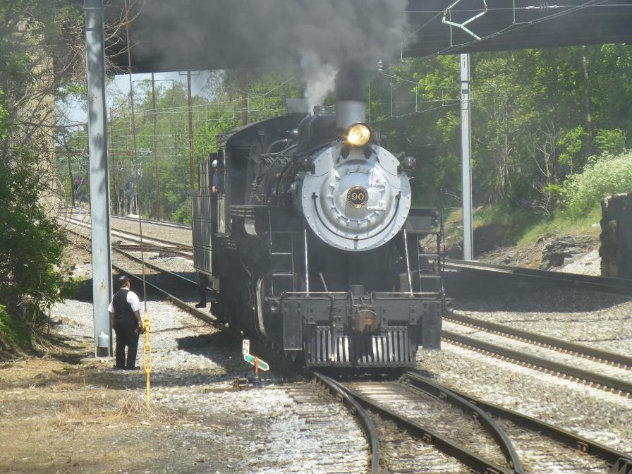 The conductor has set the points and the loco begins to move forward. The main freight and Amtrak lines can be seen on the right.
