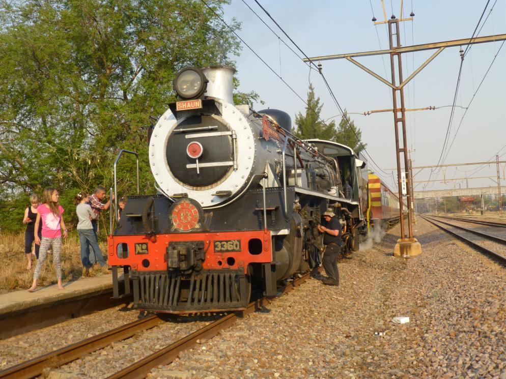 Driver Tony takes the opportunity to grease the engine