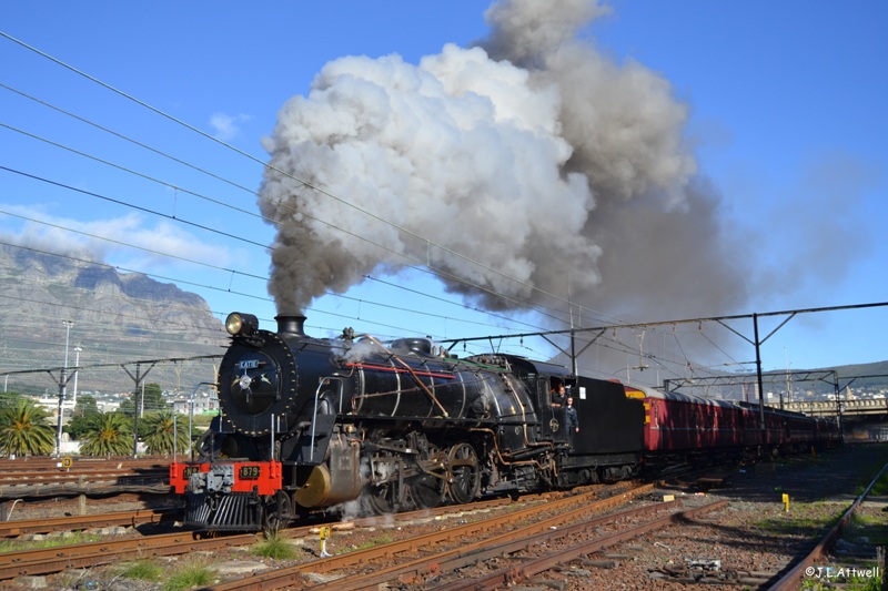 Having passed under the Nelson Mandela Boulevard road-bridge and heading towards Salt River. Table mountain in the background.