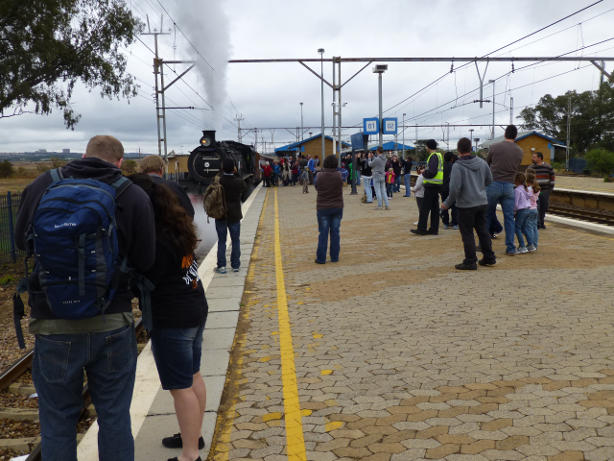 Passengers appreciate the opportunity to stretch their legs, have a smoke, and examine the loco