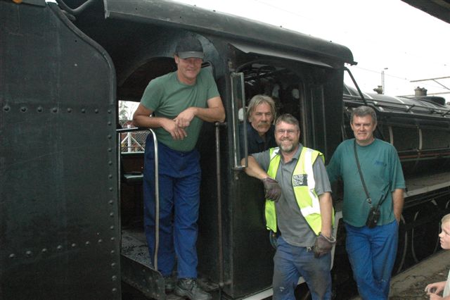 Gang of Four. Les Weideman, Willem Ras, John Ashworth and Steve Smith pose besides 2650 in the new site at Hercules, during the collection of our DZ vehicle.