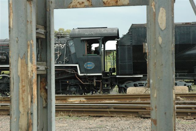 It has been many years since these electric catenery pasts have looked on to the sight of a steam locomotive in the shunting yards at Hercules. Totally ignorant of the poles delight, class 19D 2650 stands awaiting its next move.