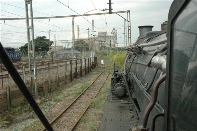Fireman's view of the departure line from the FOTR new site at Hercules. In the main yard itself can be seen the blue class 34 diesel used on the shunt. In the background stand the tall chimneys of the PPC cement works.