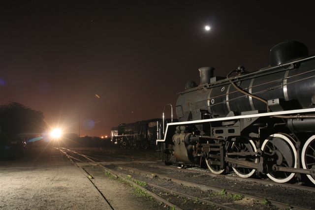 The quarter moon shines down on the shed scene. The headlight of the 19D illuminates the 15F and the 24.