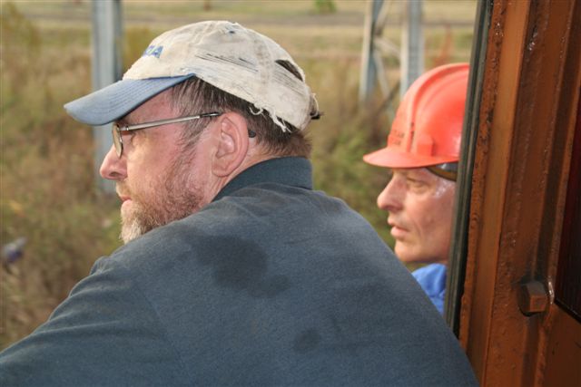 Intense concentration -John and Nathan framed by the cab.