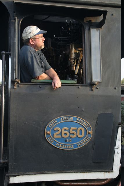 Driver in the cab - shedman John looks ahead.