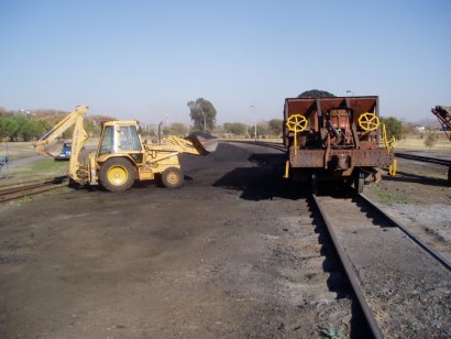 Loading coal onto the AY wagons to take up the coal stage at Capital Park<br /><br />Photo by John Ashworth August 2007