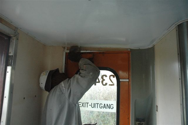 Frans is making a start on painting the roof of our new coach