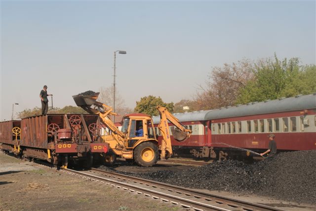 Frank and Spikkels assisting the coal-loading operation