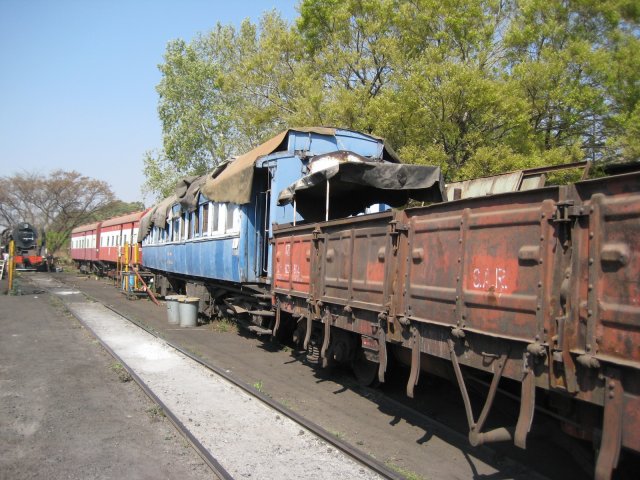 Out of the gate, with the two cabooses following obediently behind