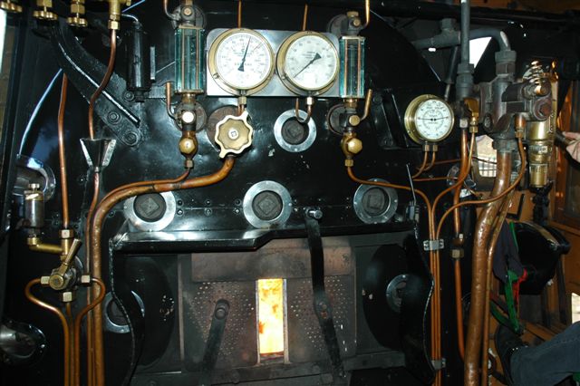 Steam is right, fire bright and signals bright. The cosy cab of 19D 2650 is the control centre for the train's operation. Fireman, Driver and Pilot are up front and keeping the safe steady pace for all the folks in the train, to have an enjoyable day out