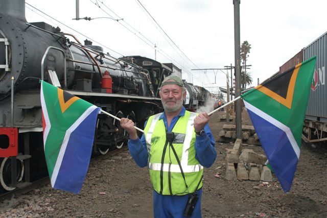 the flags are handed over to Kobus for safekeeping..