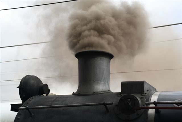 Cheugnette raising steam-and smoke-in Middelburg station.<br /><br />Photo by Chris Janisch 25/08/07
