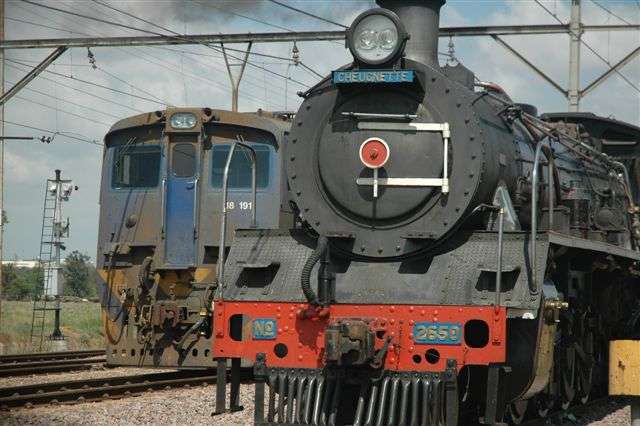 A different view of worlds apart technology, as seen on the faces of these locomotives. A time warp, but the duty of hauling for the nation still carries on