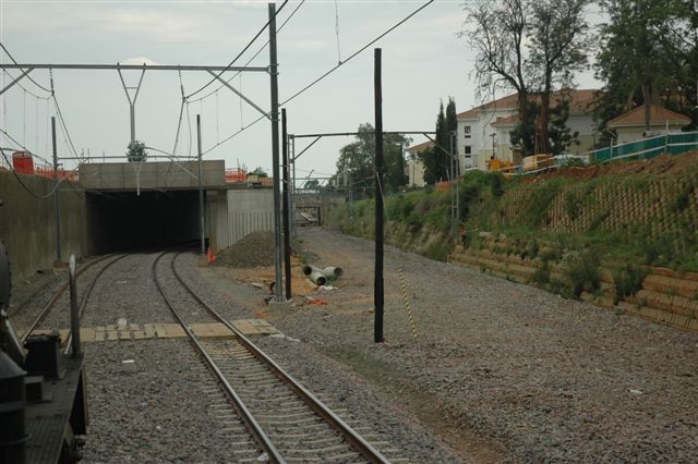 The new alignment for Transnet Freight Rail/Metro lines goes into this underpass built as part of the Gautrain developmenbt. This will be the terminal point for the new train as it reaches Hatfield, near Rissik station. The 19D makes club history as the first steamer to pass this way.
