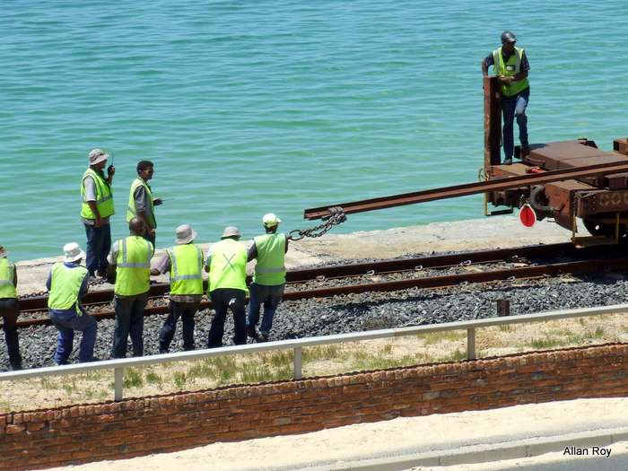 new rail is pulled off as the train moves forward