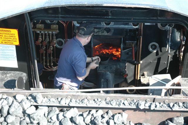 John Ashworth builds up the fire prior to departure