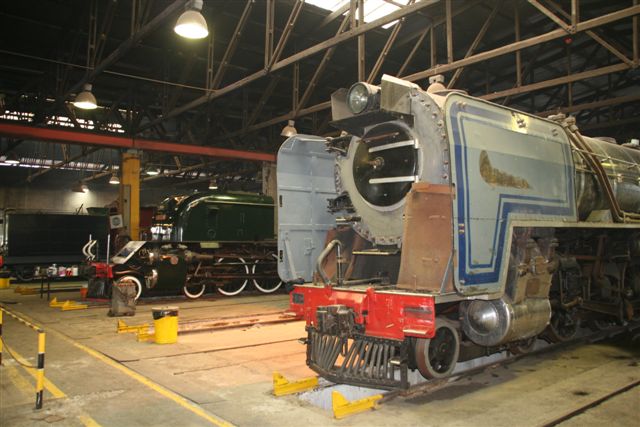 FOTR's 25NC 3404 is pictured stored safely under Germiston shed, with Sandstone's GMAM lurking in the background.