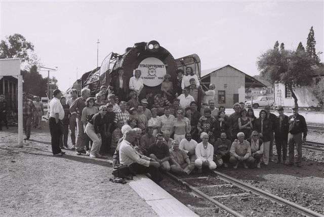 The many smiling faces from the charter train pose here at Cullinan. On the very far right is our very own John Dadford
