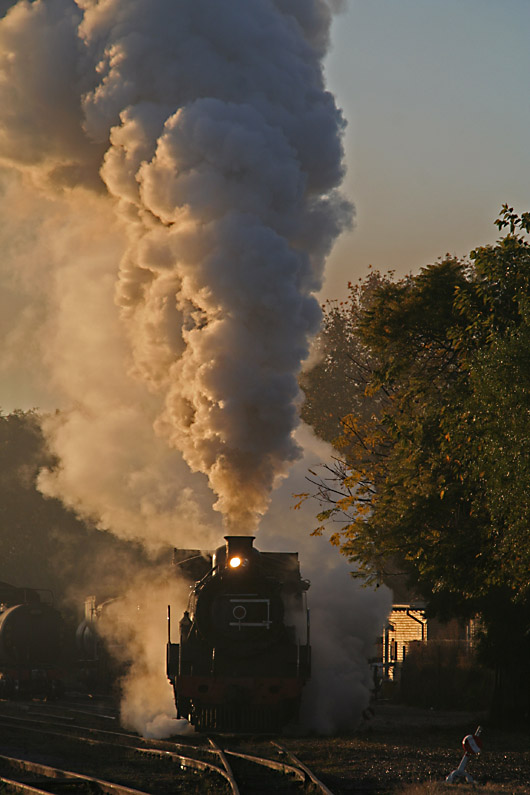 Clouds of steam at sunrise