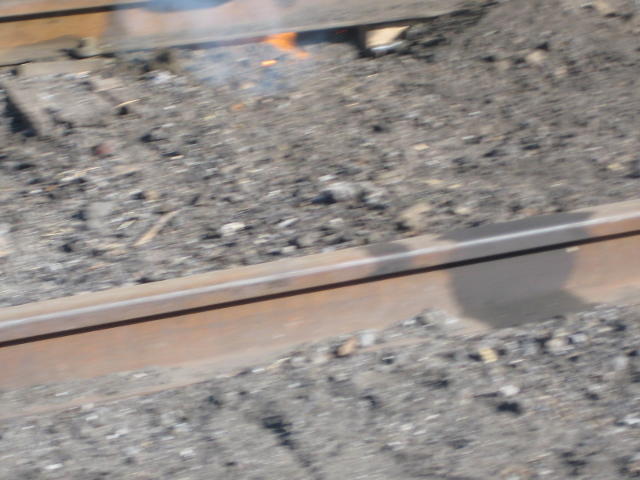 A rather blurred photo of the muzzle flash during the second experiment, when the apparatus was left open rather than buried