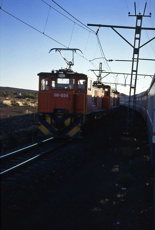 38 028 and two other engines passing the Trans Karoo