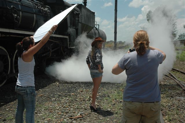 ICE Dynamic Promotions had some of their models on site at Cullinan recently and here we see one of organiser Cheri-Lee Chelin's models in action with our loco model 19D 2650 in the background.
