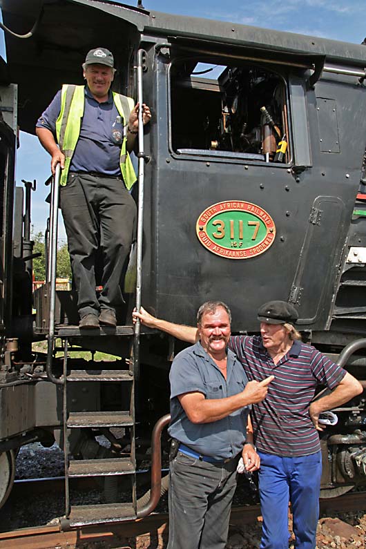 Fireman Tony Attwell, with Peter and Manie