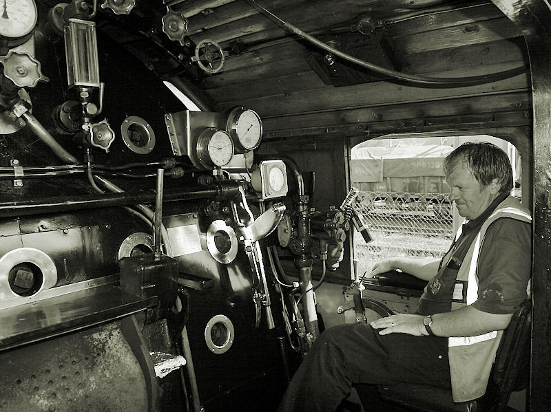 Tony Attwell looking reflective in the cab of 3117!    K R Wilson-Smith Nov 2009