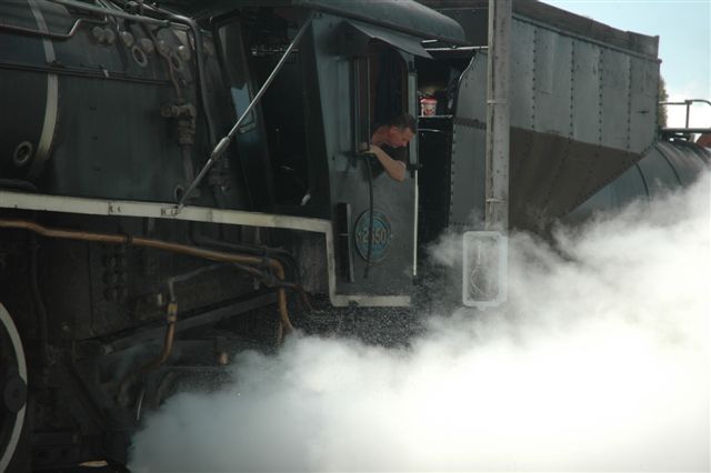 Driver Frik Boshoff blows down a boiler of water to keep the FOTR locomotive in good shape. The hard climb out of Cullinan is not a place to stall with a priming loco. This was the last Cullinan for the Year